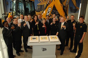 Plant and vehicle manufacturer JCB staff celebrated 65 years of operation with a special cake and gifts for employees